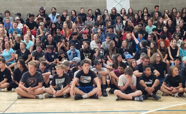 8th grade section at assembly